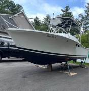 1994 Luhrs Tournament 250 Open fishing machine rea, $ 32,800